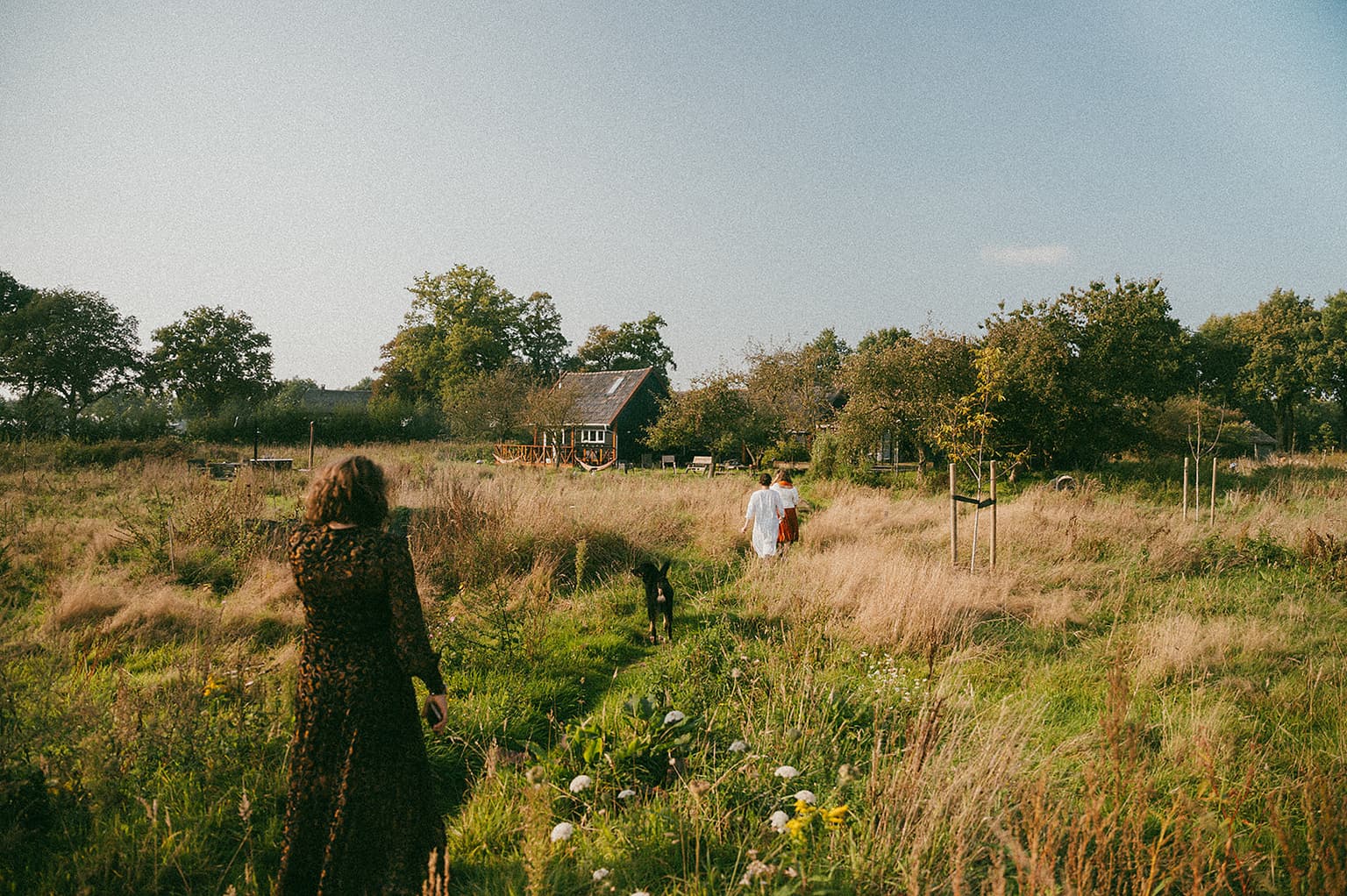Retreat guests walking through the fields around The Makers Barn
